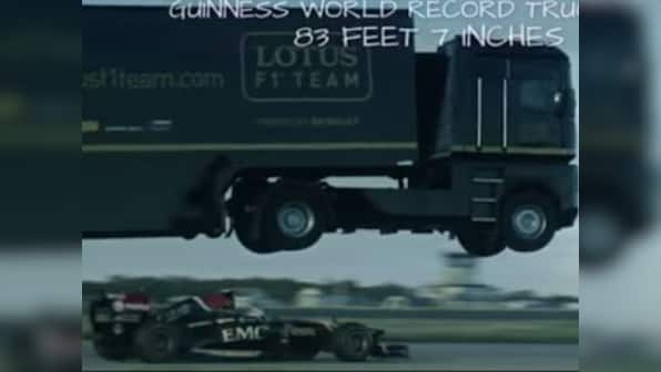 Just for fun: Semi-truck breaks world record by jumping over speeding F1 car