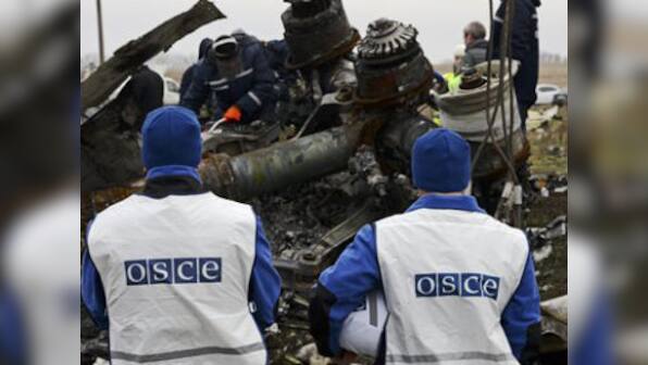 Work starts in Ukraine to collect wreckage of flight MH17 
