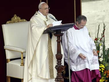Pope Francis reads his message as he celebrates a Canonization mass for Eufrasia Eluvathingal, Amato Ronconi, Antonio Farina, Kuriakose Elias Chavara, Nicola Saggio da Longobardi and Amato Ronconi in St Peter's Square, at the Vatican. AP