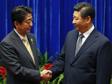Japanese PM Shinzo Abe meets China's Xi Jinping, calls it 'first step' towards reconciliation Japanese PM Shinzo Abe meets China's Xi Jinping, calls it 'first step' towards reconciliation