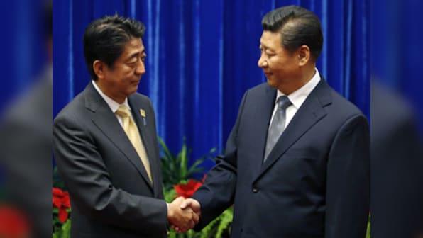 Japanese PM Shinzo Abe meets China's Xi Jinping, calls it 'first step' towards reconciliation