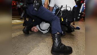 Protesters defy cops as thousands bring Hong Kong govt to a halt