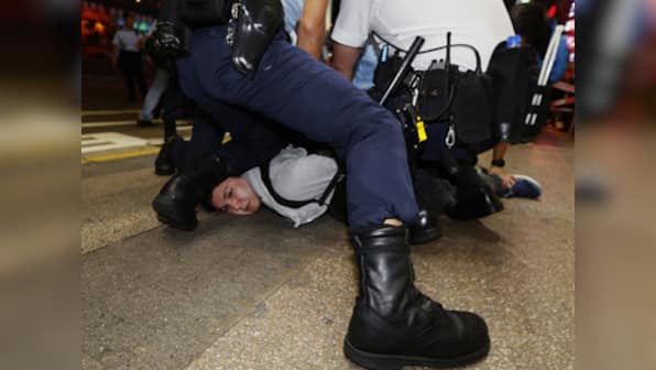 Protesters defy cops as thousands bring Hong Kong govt to a halt