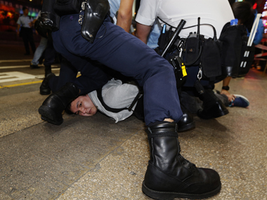 Hong Kong riot police clear protest site, arrest pro-democracy student leaders Hong Kong riot police clear protest site, arrest pro-democracy student leaders
