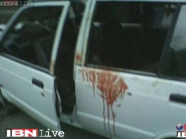 The car where the youths were shot dead. Image courtesy: IBNLive