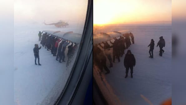 How to get a frozen plane rolling in Siberia? Get passengers to push it