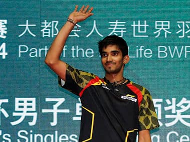 India's Kidambi Srikanth (R) waves on the podium after winning the China Open. Reuters