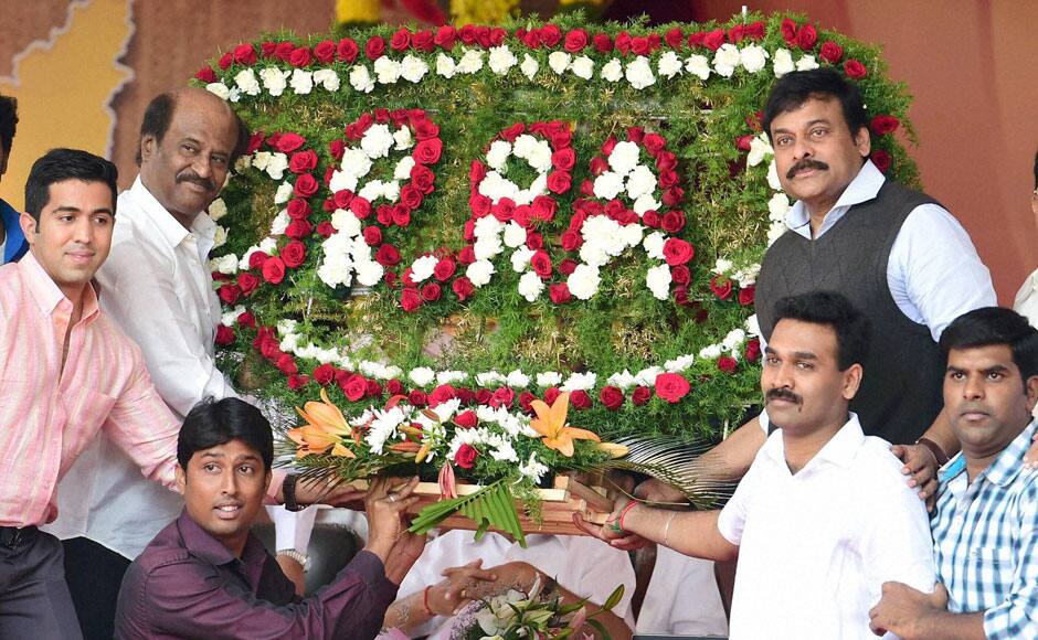 Bengaluru : Super Star Rajnikant and Mega Star Chiranjivi being given a floral board during the inauguration of Dr Rajkumar’s Memorial in Bengaluru on Saturday. Spread across 2.5 acres, the memorial is supposed to be the biggest built for any cine actor in the country. PTI