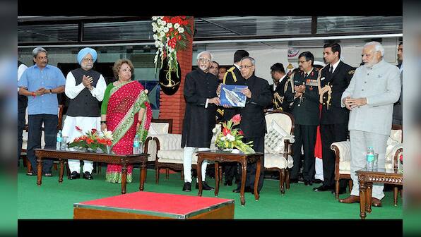 Photos: Narendra Modi, Manmohan Singh share stage at Navy Day celebrations