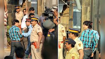 Fan moment: Watch Shah Rukh being shooed away by security from the gates of Mannat