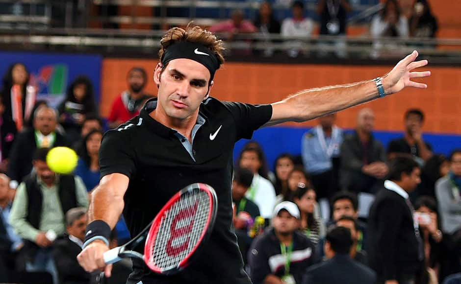 New Delhi: Micromax India Aces, Roger Federer during his singles match against Singapore Salmmers at the International Premier Tennis League (IPTL) at IGI stadium in New Delhi on Sunday. PTI 
