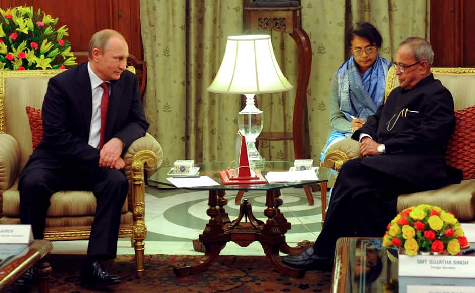 Russian President Vladimir Putin, left, and Indian President Pranab Mukherjee meet in New Delhi, India, Thursday, Dec. 11, 2014. Facing a stumbling economy at home and increasingly biting Western sanctions, Russian President Vladimir Putin sought Thursday to strengthen once-close relationship with India through an ambitious plan to help New Delhi build at least 12 new nuclear reactors. (AP Photo/RIA Novosti Kremlin, Mikhail Klimentyev, Presidential Press Service)