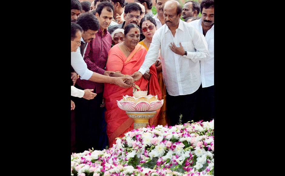 Bengaluru : Super Star Rajnikant, Mega Star Chiranjivi and Parvatamma Rajkumar light the jyoti during the inauguration of Dr Rajkumar’s Memorial in Bengaluru on Saturday. Spread across 2.5 acres, the memorial is supposed to be the biggest built for any cine actor in the country. PTI
