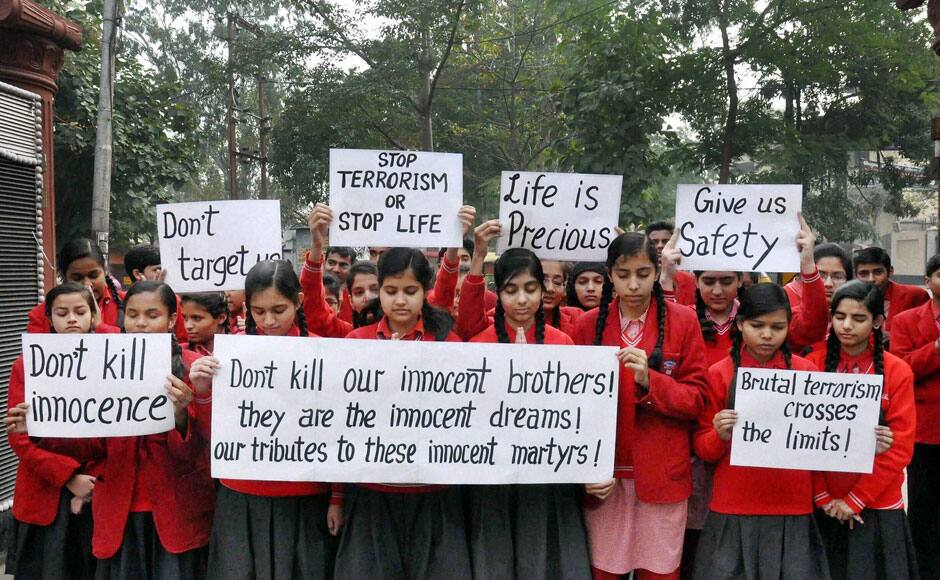 Moradabad: School children in Moradabad pay tributes to the children killed in Pakistan terror attack, on Wednesday. PTI 