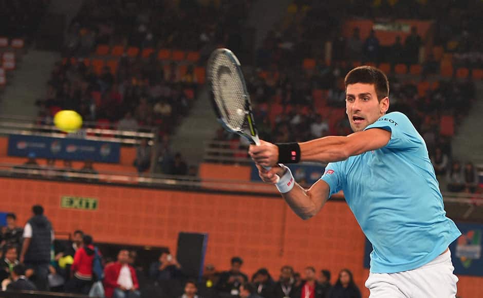 New Delhi: UAE Royals player Novak Djokovic during the men's doubles match against Manila Mavericks, at the International Premier Tennis League (IPTL) at IGI stadium in New Delhi on Sunday. PTI 