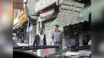 British-born photojournalist 'killed by al-Qaida after failed rescue attempt in Yemen'.