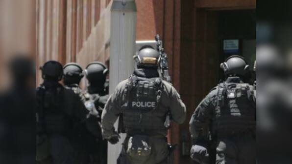 Brighton siege: Melbourne police shoots hostage-taker, woman rescued, three officers injured in operation