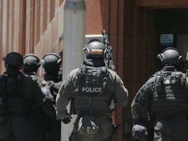 Brighton siege: Melbourne police shoots hostage-taker, woman rescued, three officers injured in operation