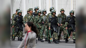 'This is not a good place for religion': China's Uighur Muslims struggle under 'police state'
