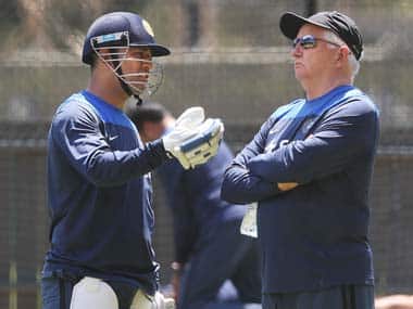 MS Dhoni (left) wasn't doing enough for India. Getty Sports