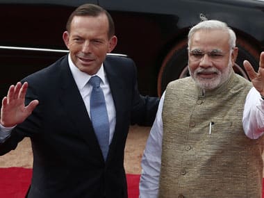 PM Narendra Modi (right) with Australian PM Tony Abbott. Agencies