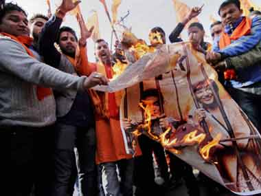 Bajrang Dal activists at it again: Attack Delhi theatre, tear PK posters Bajrang Dal activists at it again: Attack Delhi theatre, tear PK posters