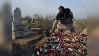 In Peshawar, even the gravedigger wept as he buried victims of the massacre