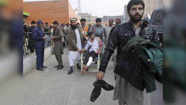 Over 120 people, mostly children, killed in Taliban attack on Peshawar school