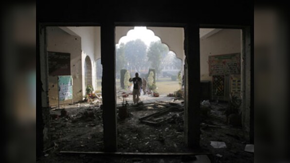 Militants set two primary schools ablaze as Pakistan extends winter break