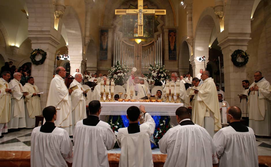 Photos Joy and prayers mark Christmas celebrations across the globe