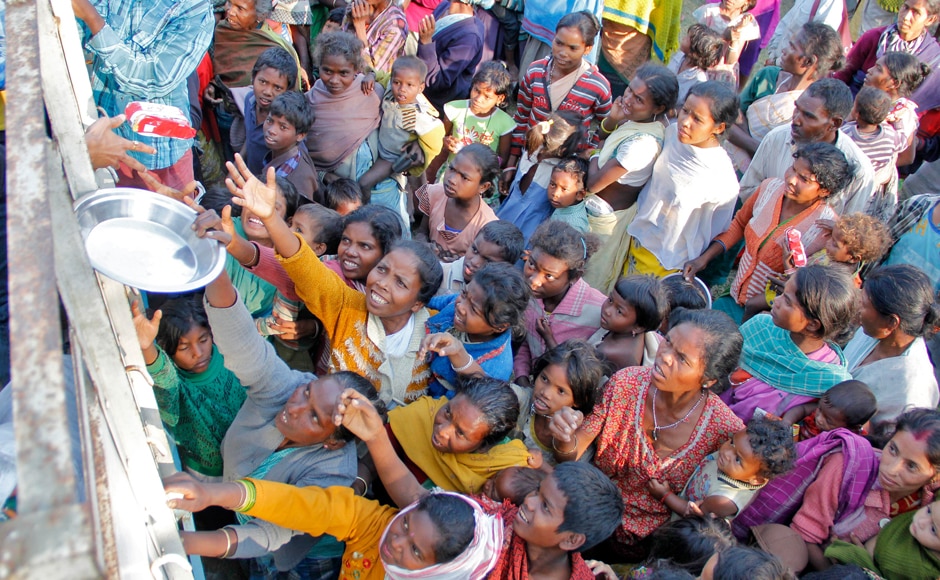 Photos: In Village Worst Hit By Assam Violence, Houses Burn, Hundreds ...