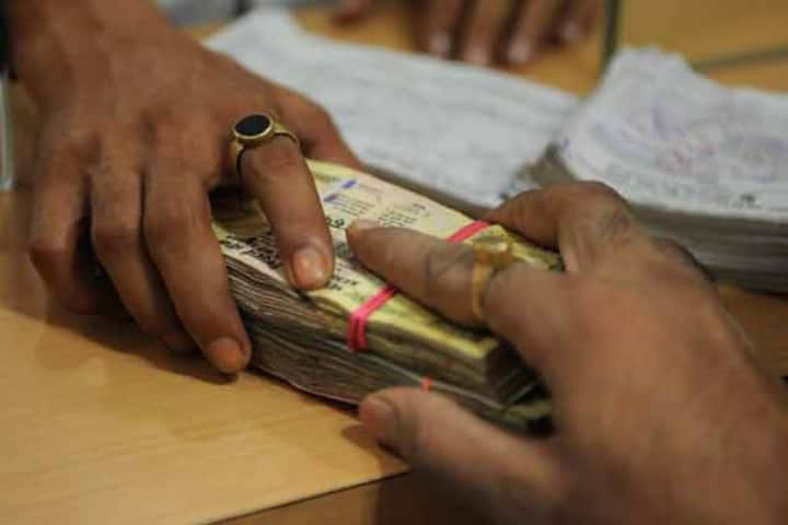 Rupee down marginally due to dollar demand from importers, banks