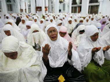 A decade on, Asia mourns victims of 2004 tsunami amid memorial services and prayers A decade on, Asia mourns victims of 2004 tsunami amid memorial services and prayers