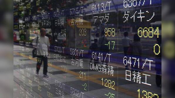 Dow ends over 18000 for first time ever as US GDP is at best pace in 11 years