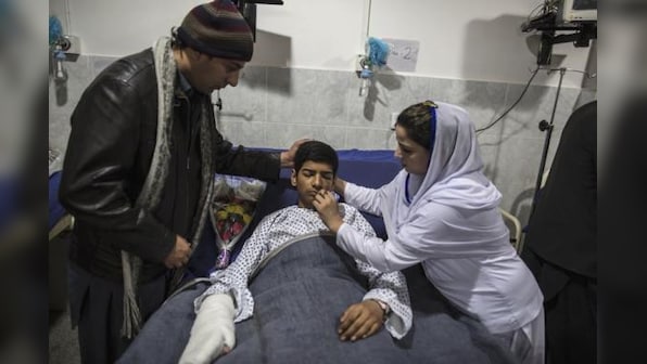 Rage, tears and broken childhoods as Pakistan reels from massacre