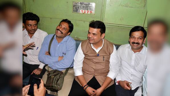 Aam aadmi CM: Maharashtra's Fadnavis takes a ride on local, clicks selfies with passengers
