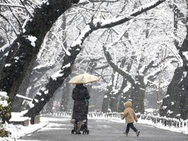 Snow storm in Japan kills 11, forecasters say bad weather to continue