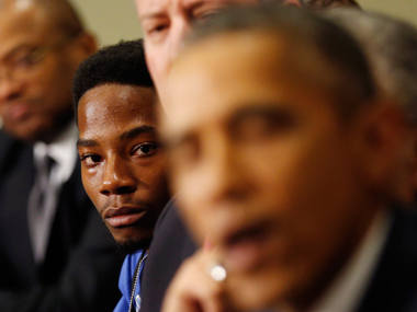 President Obama shuns 'militarized' police culture but stays away from riot-hit Ferguson President Obama shuns 'militarized' police culture but stays away from riot-hit Ferguson