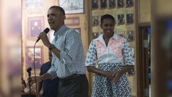 Barack Obama spends Christmas singing carols, visiting US troops in Hawaii
