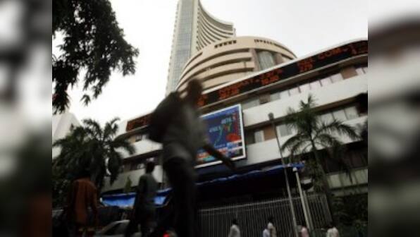 Selling in FMCG, auto pulls Sensex down 110 points; rupee falls 6 paise to 63.57 vs dollar