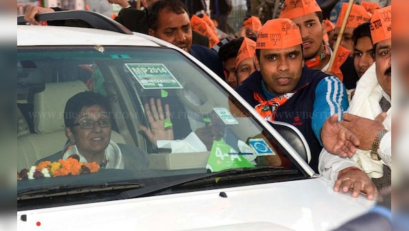 Photos: In Delhi's Trilokpuri, Kiran Bedi gets lukewarm response from voters 