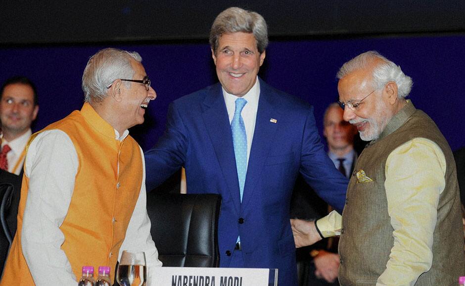 Gandhinagar: Prime Minister, Narendra Modi with US Secretary of State, John Kerry and Governor of Gujarat, O.P. Kohli at Vibrant Gujarat Global Summit 2015 in Gandhinagar, Gujarat on Sunday. PTI 