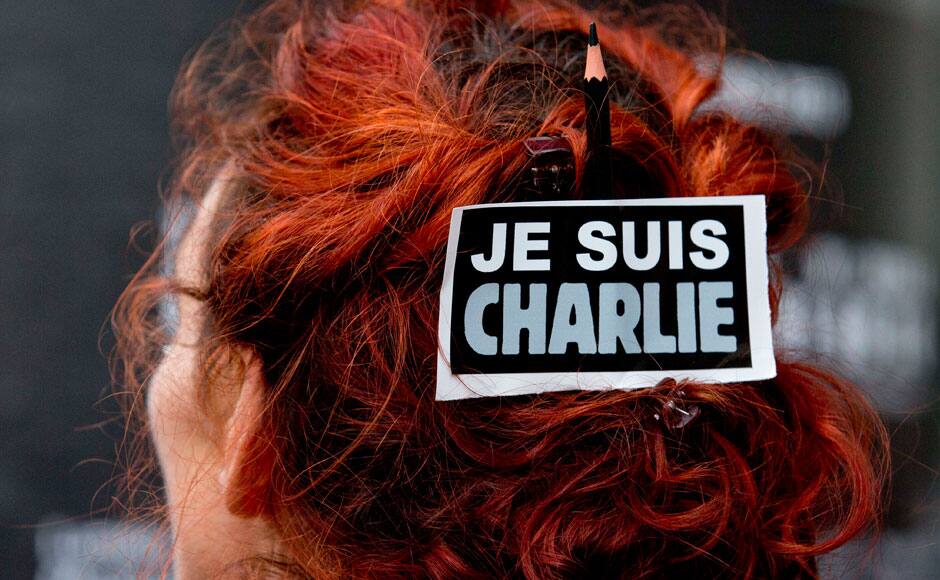 A demonstrator has a sticker 