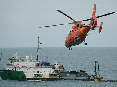 Divers fail to get black boxes; AirAsia Flight 8501's tail may be lifted Divers fail to get black boxes; AirAsia Flight 8501's tail may be lifted