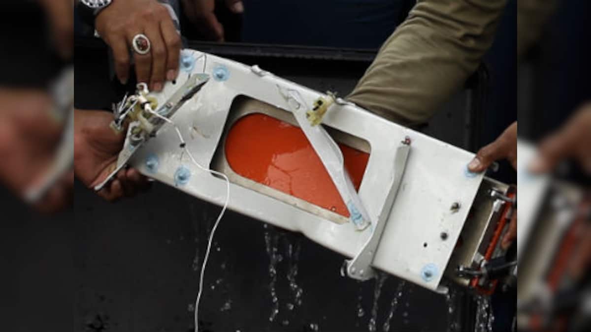Singapore navy locates fuselage of crashed AirAsia flight at bottom of ...