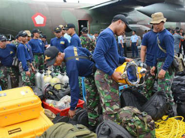 Indonesia confirms that tail of AirAsia's QZ8501 found, search on for the black box Indonesia confirms that tail of AirAsia's QZ8501 found, search on for the black box