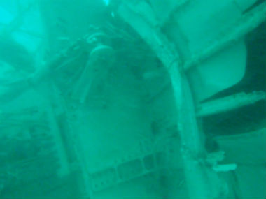 Divers search AirAsia jet's fuselage, Fail to retrieve more bodies Divers search AirAsia jet's fuselage, Fail to retrieve more bodies