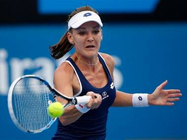 Agnieszka Radwanska of Poland makes a forehand return to Kurumi Nara. AP