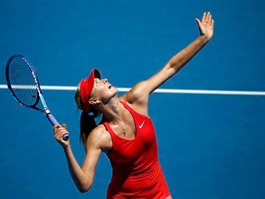 Maria Sharapova of Russia serves to her compatriot Ekaterina Makarova. AP
