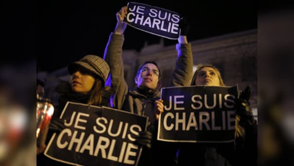 Prophet Mohammed holds Je Suis Charlie sign: New issue of Charlie Hebdo sells out in minutes